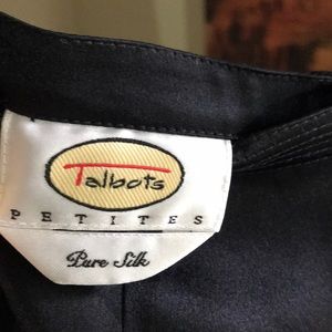 Designer under $25! Elegant Silk black skirt